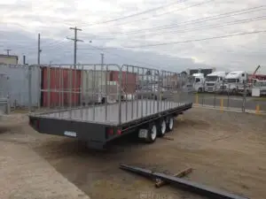 20x7 Tri Axle Flat Top with Truck Gates, 2000kg ATM